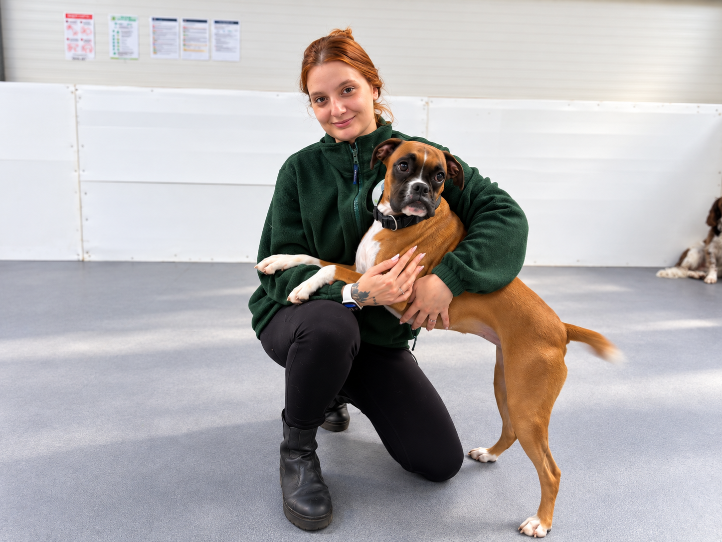Natasha Rattacasso with a dog at Creedons Dog Care